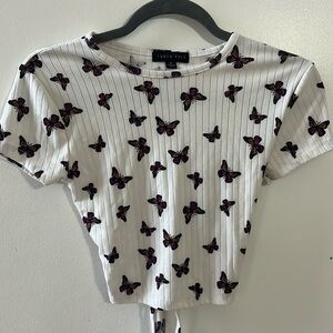 Medium crop top, white with orange and purple butterflies.